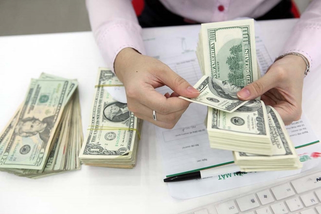 Đổi USD ở tiệm vàng, phạt đến 100 triệu đồng